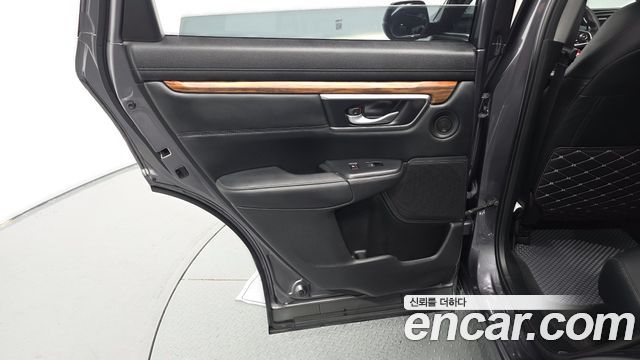 Honda CR-V (V) 2.0 Hybrid Touring 4WD 2021 — фото 25