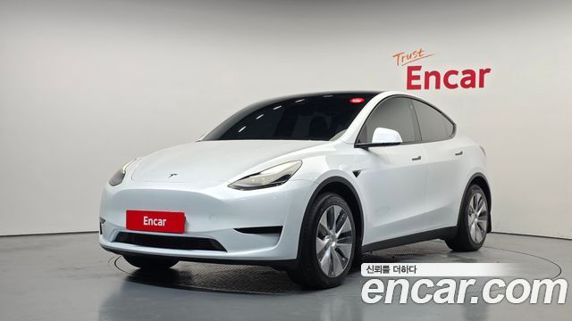 Tesla Model Y RWD 2024 — фото 1