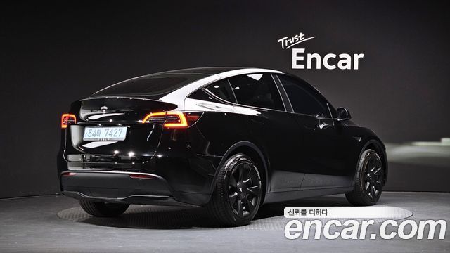 Tesla Model Y RWD 2024 — фото 2
