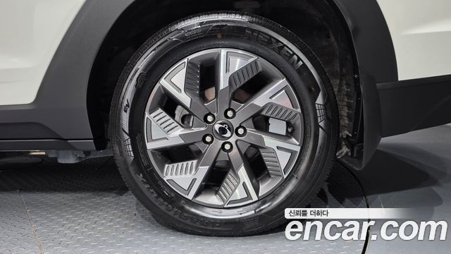KG Mobility (SsangYong) Torres EVX TV7 2024 — фото 27