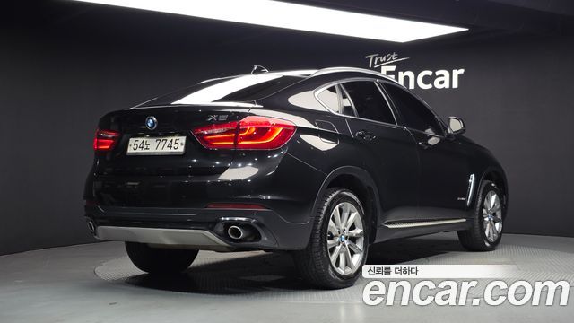 BMW X6 (F16) xDrive 30d 2015 — фото 2