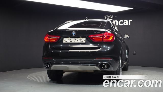BMW X6 (F16) xDrive 30d 2015 — фото 4
