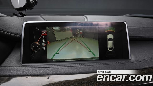 BMW X6 (F16) xDrive 30d 2015 — фото 19