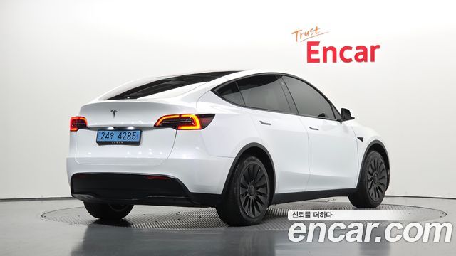 Tesla Model Y RWD 2024 — фото 2