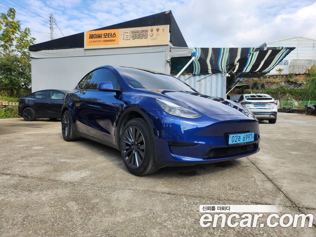 Tesla Model Y RWD 2024 — фото 2