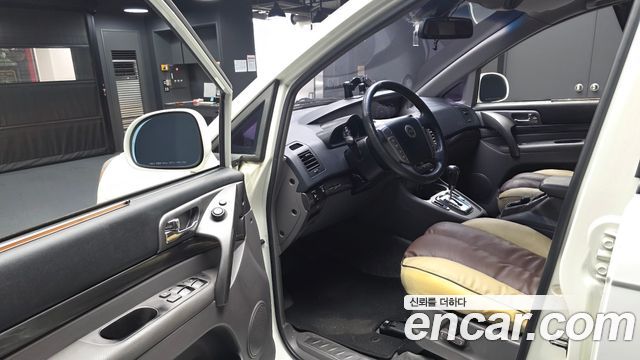 KG Mobility (SsangYong) Korando Turismo 4WD GT 9-seater 2014 — фото 10