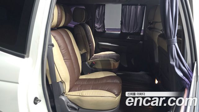 KG Mobility (SsangYong) Korando Turismo 4WD GT 9-seater 2014 — фото 11