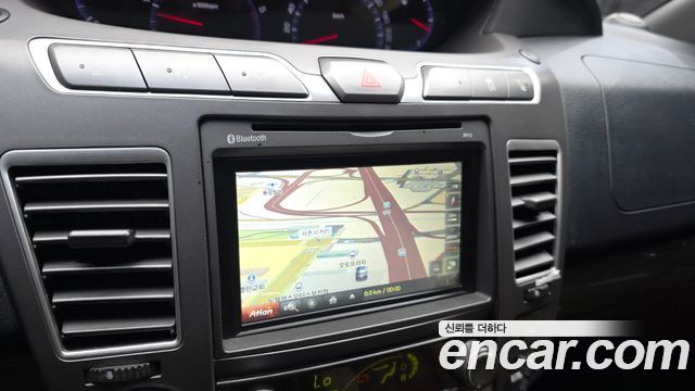 KG Mobility (SsangYong) Korando Turismo 4WD GT 9-seater 2014 — фото 16