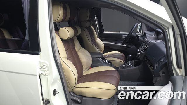KG Mobility (SsangYong) Korando Turismo 4WD GT 9-seater 2014 — фото 26
