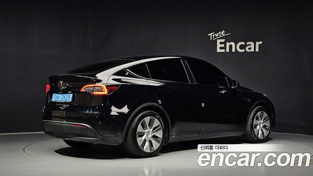 Tesla Model Y RWD 2023 — фото 2