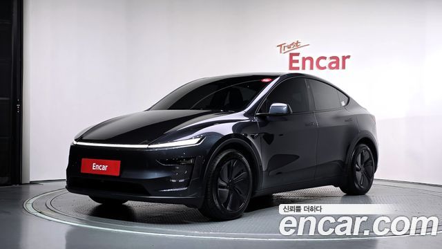 Tesla Model Y RWD 2025 — фото 1
