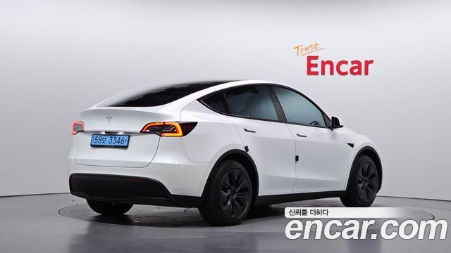 Tesla Model Y RWD 2024 — фото 2