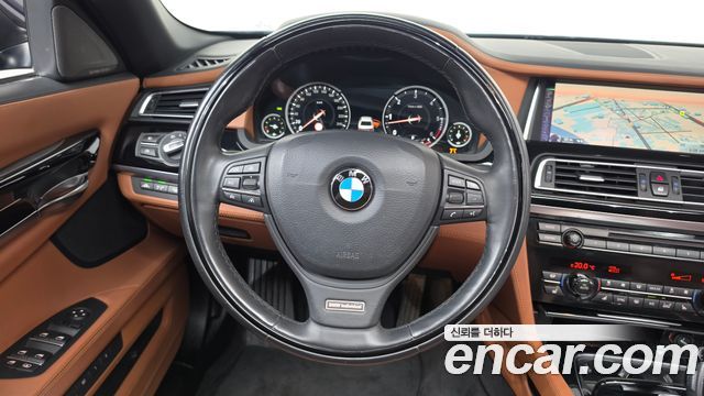 BMW 7 Series (F01) 740d xDrive Individual 2015 — фото 14