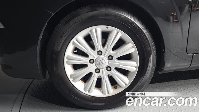 KG Mobility (SsangYong) Korando Turismo 2WD GT 11-seater 2014 — фото 5