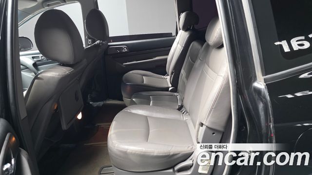 KG Mobility (SsangYong) Korando Turismo 2WD GT 11-seater 2014 — фото 11