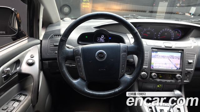 KG Mobility (SsangYong) Korando Turismo 2WD GT 11-seater 2014 — фото 14