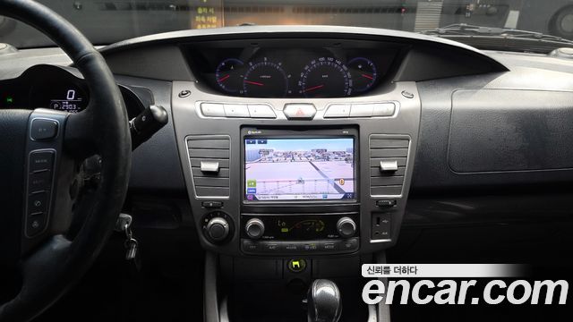 KG Mobility (SsangYong) Korando Turismo 2WD GT 11-seater 2014 — фото 15