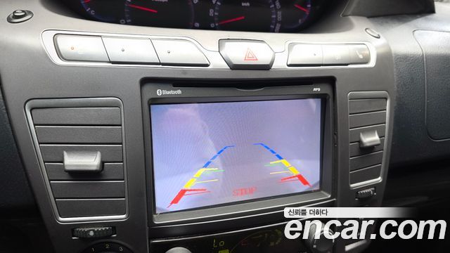 KG Mobility (SsangYong) Korando Turismo 2WD GT 11-seater 2014 — фото 17