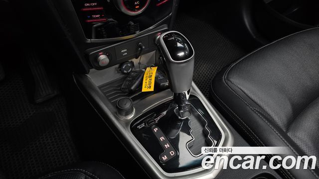 KG Mobility (SsangYong) Tivoli VX 2WD 2015 — фото 9