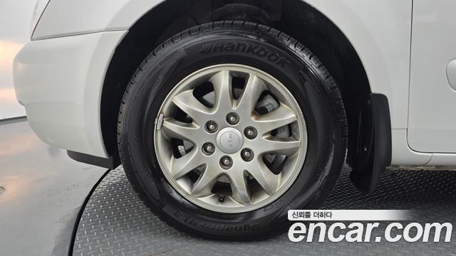 Kia Carnival R Grand Carnival GLX Premium 2012 — фото 5