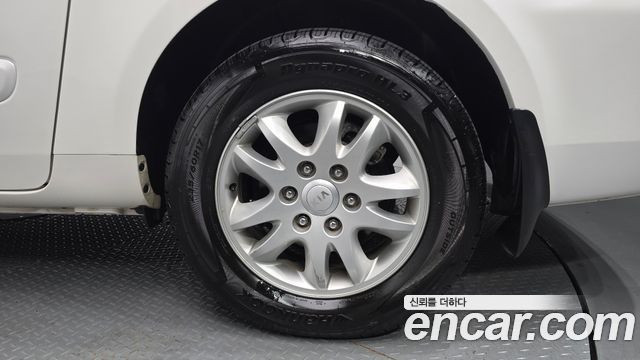 Kia Carnival R Grand Carnival GLX Premium 2012 — фото 27