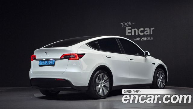 Tesla Model Y RWD 2024 — фото 2