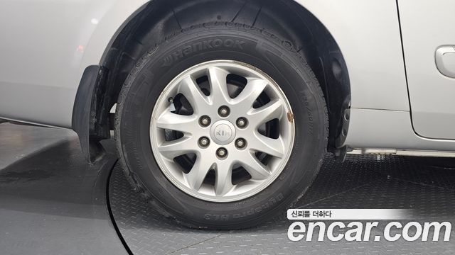 Kia Carnival R Grand Carnival GLX Premium 2012 — фото 5
