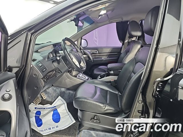 KG Mobility (SsangYong) Korando Turismo 4WD TX 9-seater 2017 — фото 15
