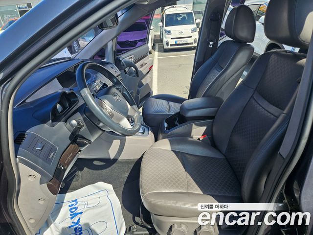 KG Mobility (SsangYong) Korando Turismo 2WD TX 11-seater 2016 — фото 7