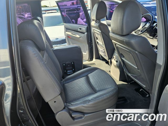 KG Mobility (SsangYong) Korando Turismo 2WD TX 11-seater 2016 — фото 15