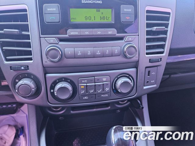 KG Mobility (SsangYong) Korando Turismo 2WD TX 11-seater 2016 — фото 18