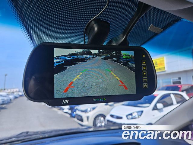 KG Mobility (SsangYong) Korando Turismo 2WD TX 11-seater 2016 — фото 22