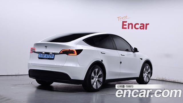 Tesla Model Y Standard Range RWD 2021 — фото 2