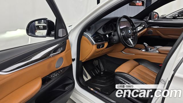 BMW X6 (F16) M50d 2016 — фото 10