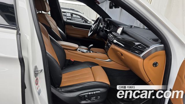 BMW X6 (F16) M50d 2016 — фото 15