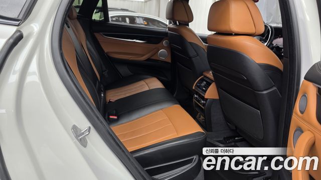 BMW X6 (F16) M50d 2016 — фото 16