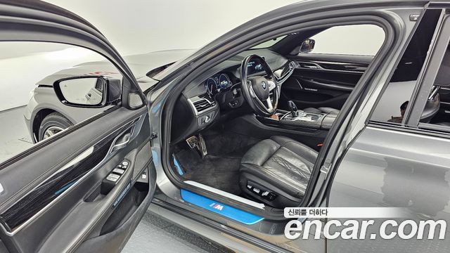 BMW 7 Series (G11) 740d xDrive M Sport 2018 — фото 11