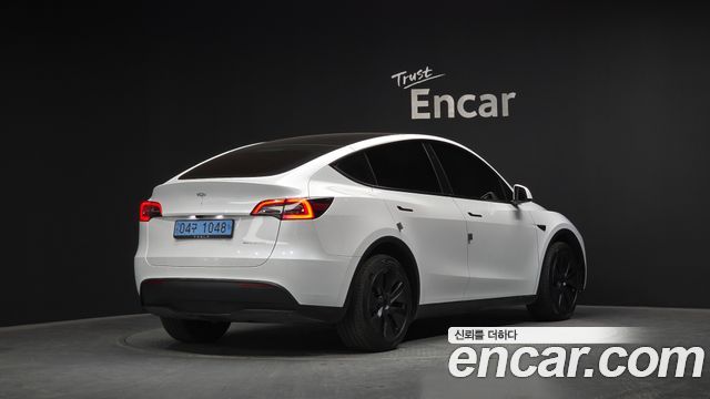Tesla Model Y Long Range AWD 2024 — фото 2