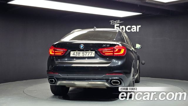 BMW X6 (F16) xDrive 40d 2015 — фото 4