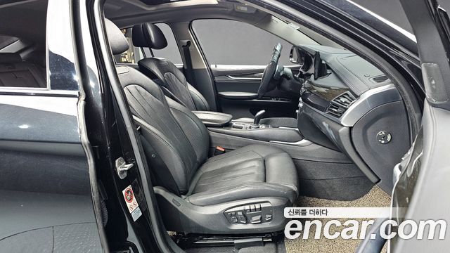 BMW X6 (F16) xDrive 40d 2015 — фото 10