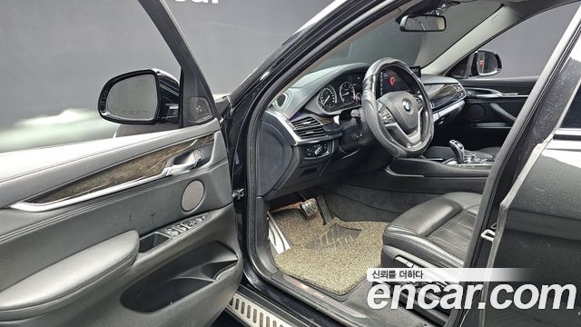 BMW X6 (F16) xDrive 40d 2015 — фото 11