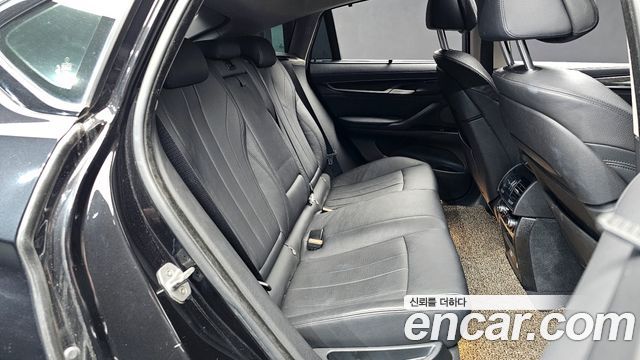 BMW X6 (F16) xDrive 40d 2015 — фото 12