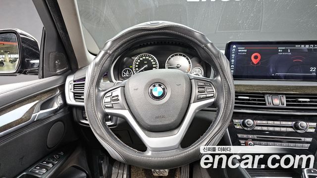 BMW X6 (F16) xDrive 40d 2015 — фото 13