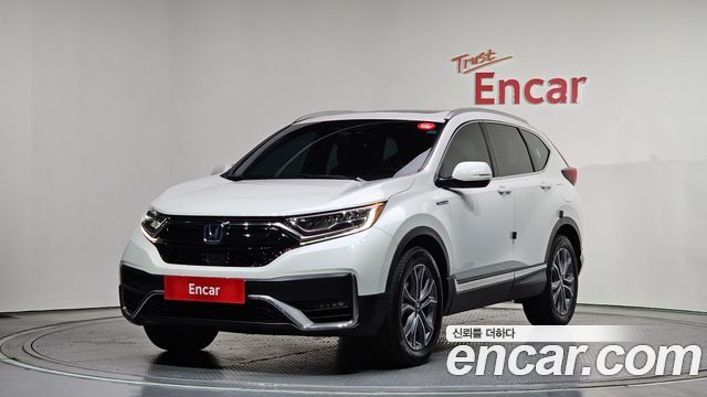 Honda CR-V (V) 2.0 Hybrid Touring 4WD 2022 — фото 1