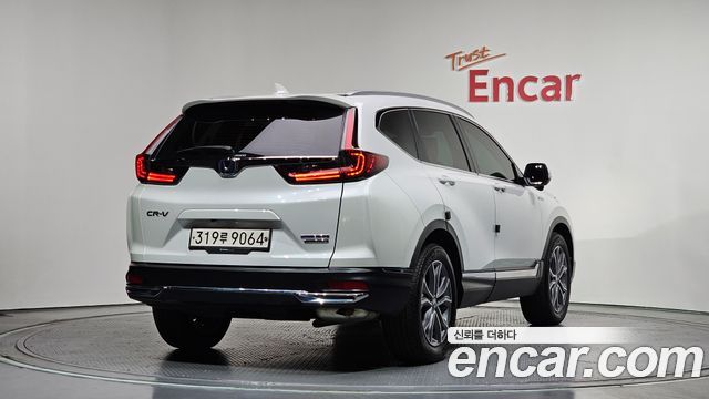 Honda CR-V (V) 2.0 Hybrid Touring 4WD 2022 — фото 2