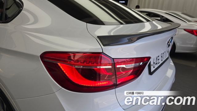BMW X6 (F16) M50d 2018 — фото 29
