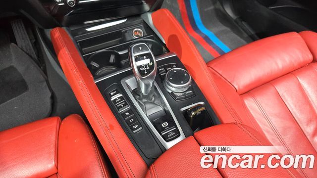 BMW X6 (F16) xDrive 35i 2016 — фото 9
