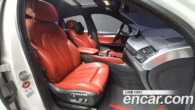BMW X6 (F16) xDrive 35i 2016 — фото 11