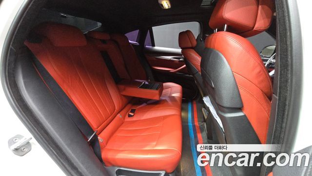 BMW X6 (F16) xDrive 35i 2016 — фото 12