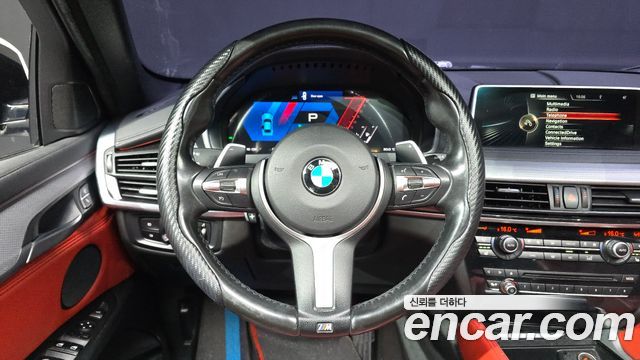 BMW X6 (F16) xDrive 35i 2016 — фото 13